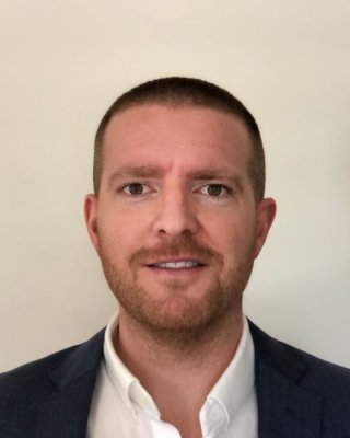 Ben Kleinstiver Headshot. 